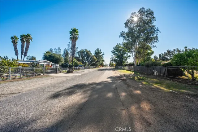 a view of road with trees