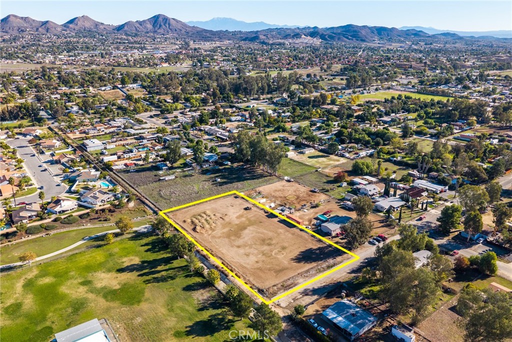 20220 Union Street Wildomar, CA 92595 - Photo 3 of 13 an aerial view of residential houses and city street
