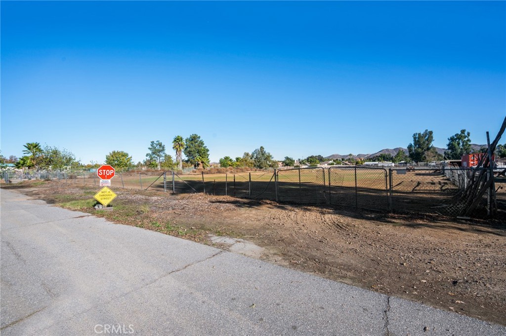 20220 Union Street Wildomar, CA 92595 - Photo 7 of 13 a view of backyard with a car parked