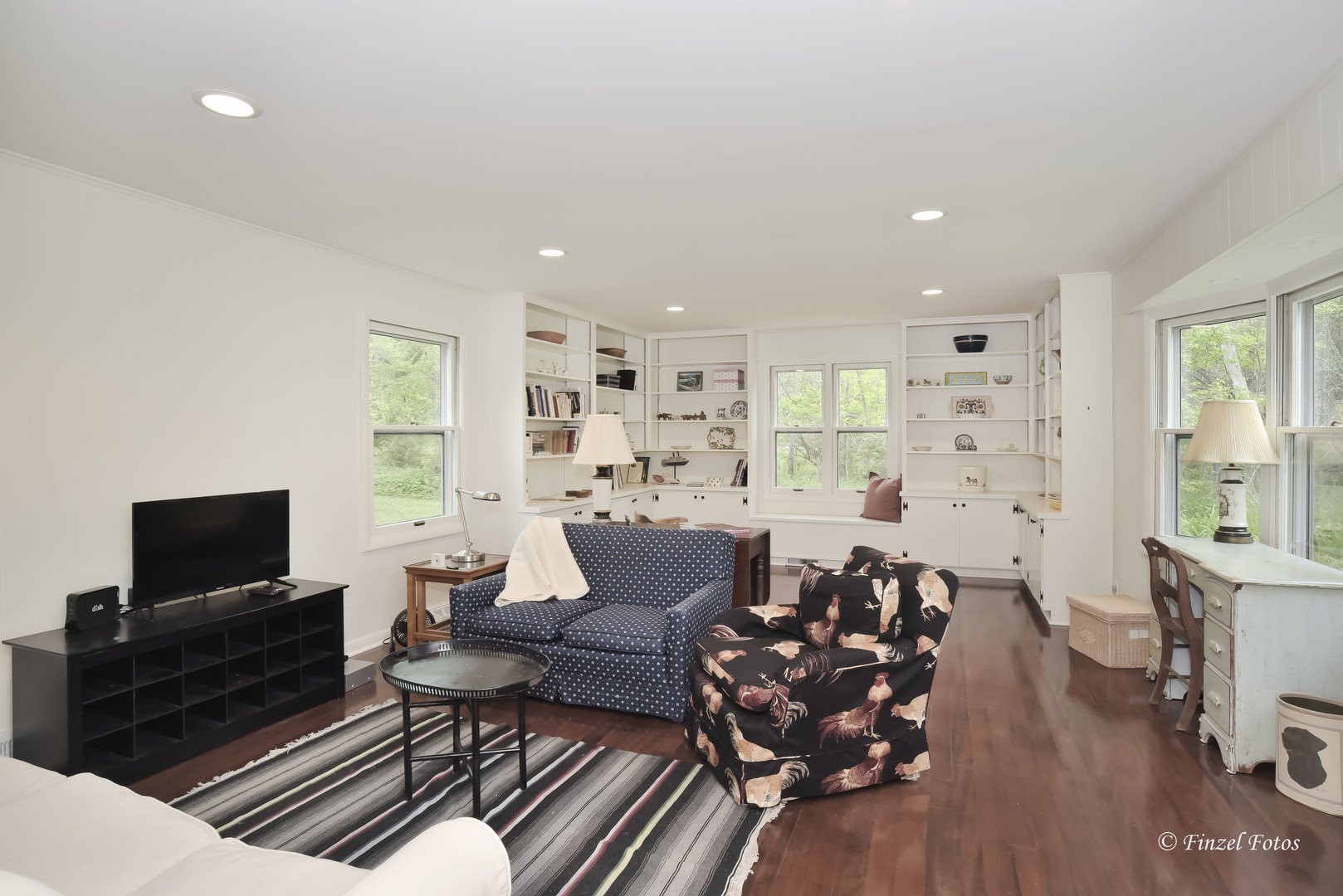 9313 Bull Valley Road Bull Valley, IL 60098 - Photo 13 of 31 a living room with furniture or wooden floor and a flat screen tv