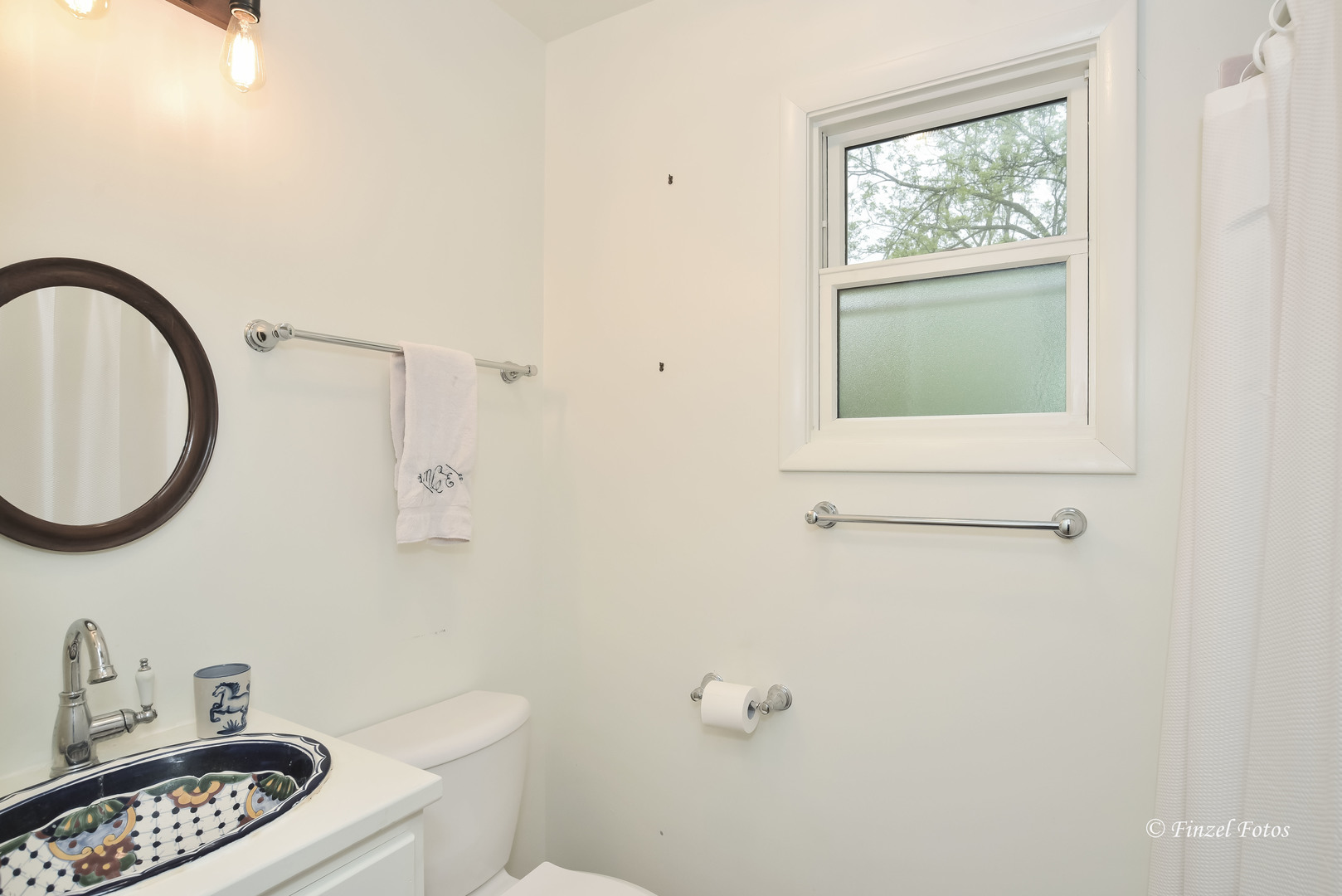 9313 Bull Valley Road Bull Valley, IL 60098 - Photo 18 of 31 a bathroom with a toilet a sink and a window