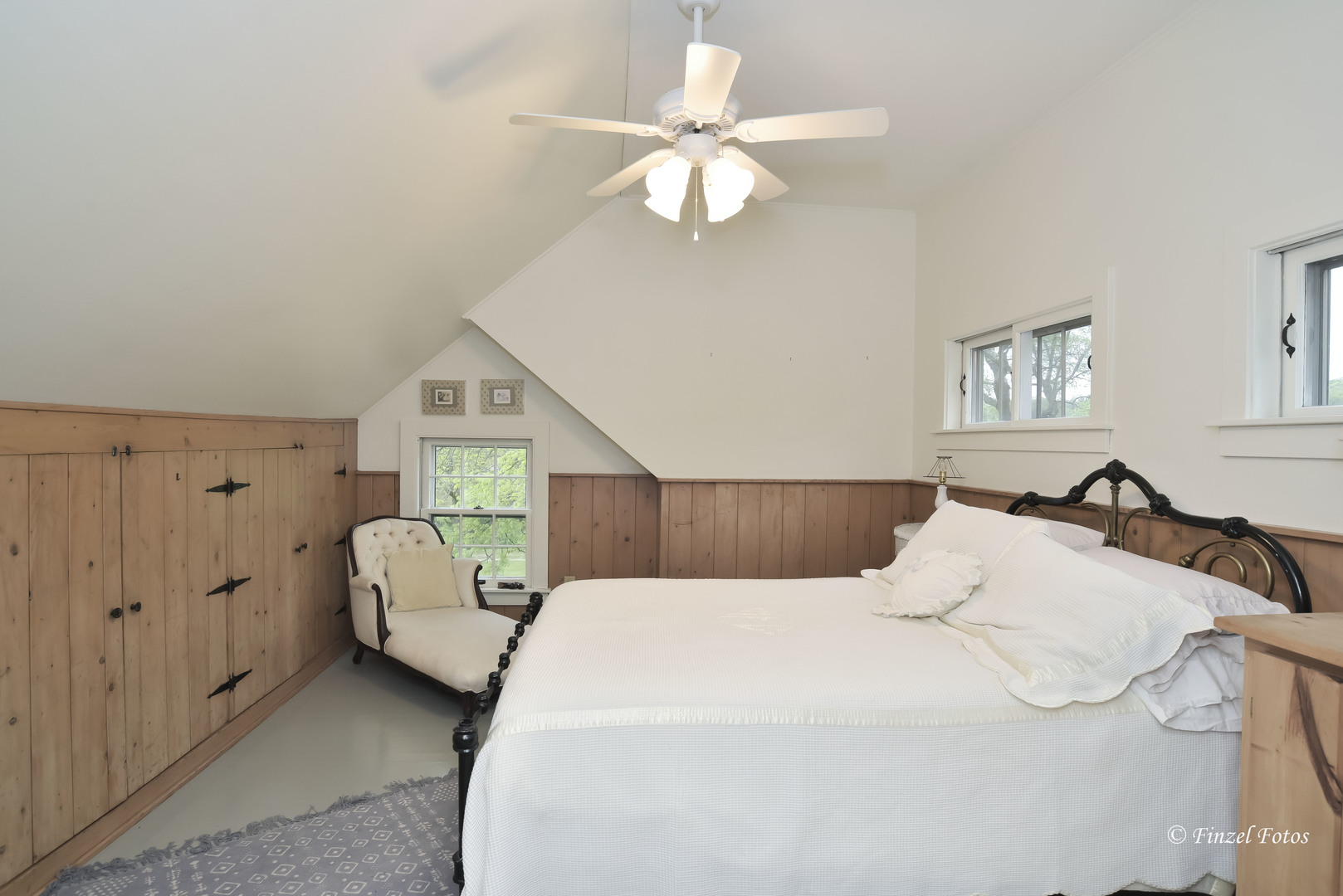 9313 Bull Valley Road Bull Valley, IL 60098 - Photo 20 of 31 a bedroom with a white bed and white walls