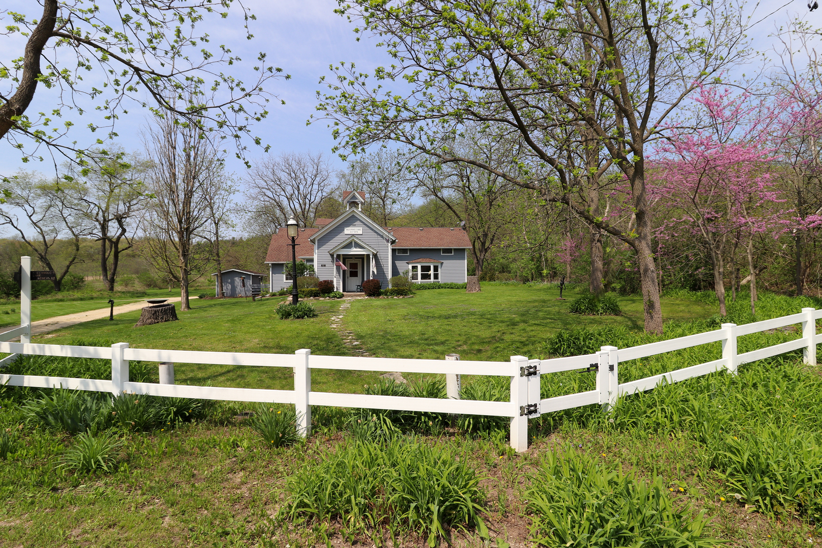 9313 Bull Valley Road Bull Valley, IL 60098 - Photo 2 of 31 a view of a house with a yard