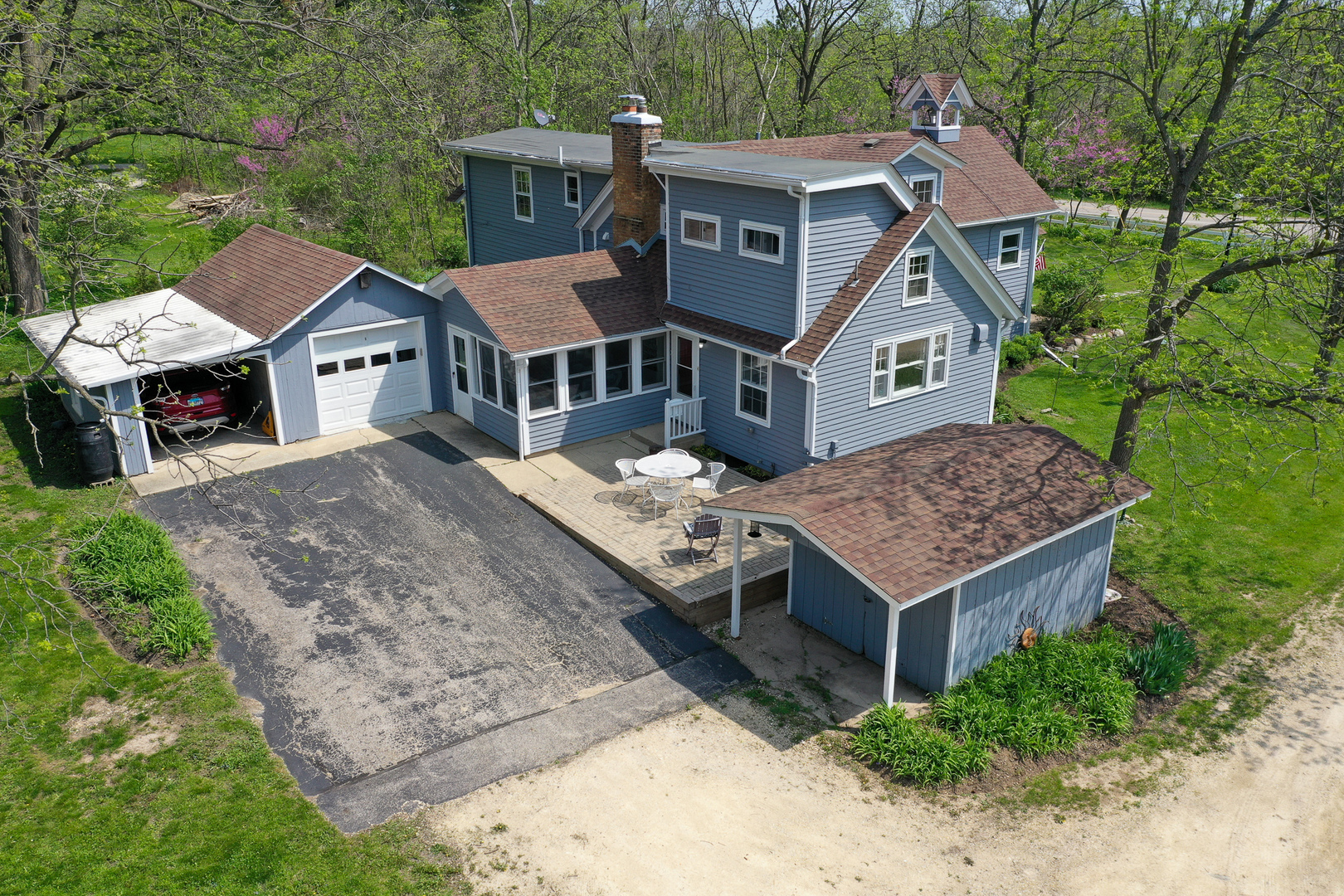 9313 Bull Valley Road Bull Valley, IL 60098 - Photo 23 of 31 a aerial view of a house with a yard