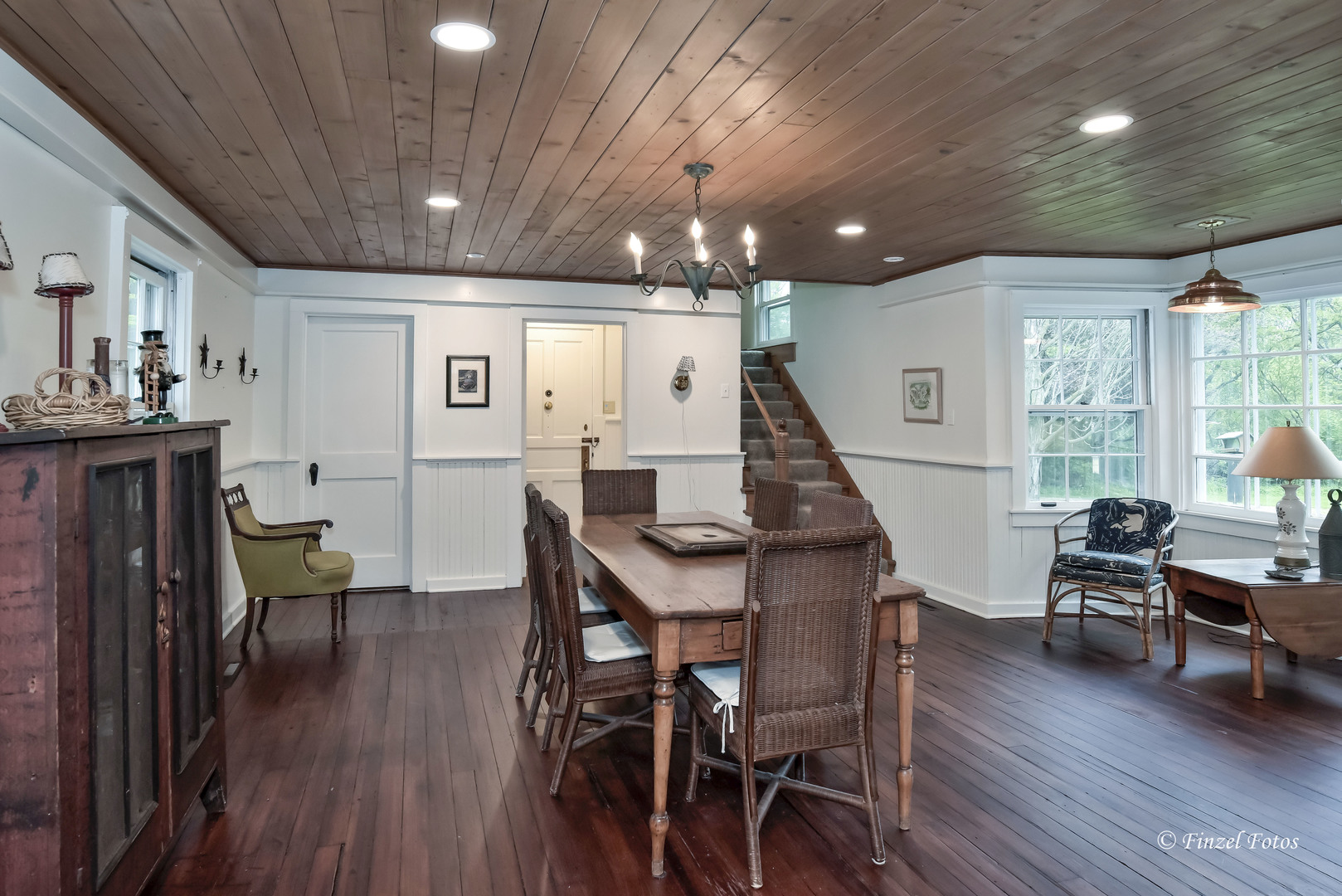 9313 Bull Valley Road Bull Valley, IL 60098 - Photo 7 of 31 a view of a dining room with furniture window and wooden floor