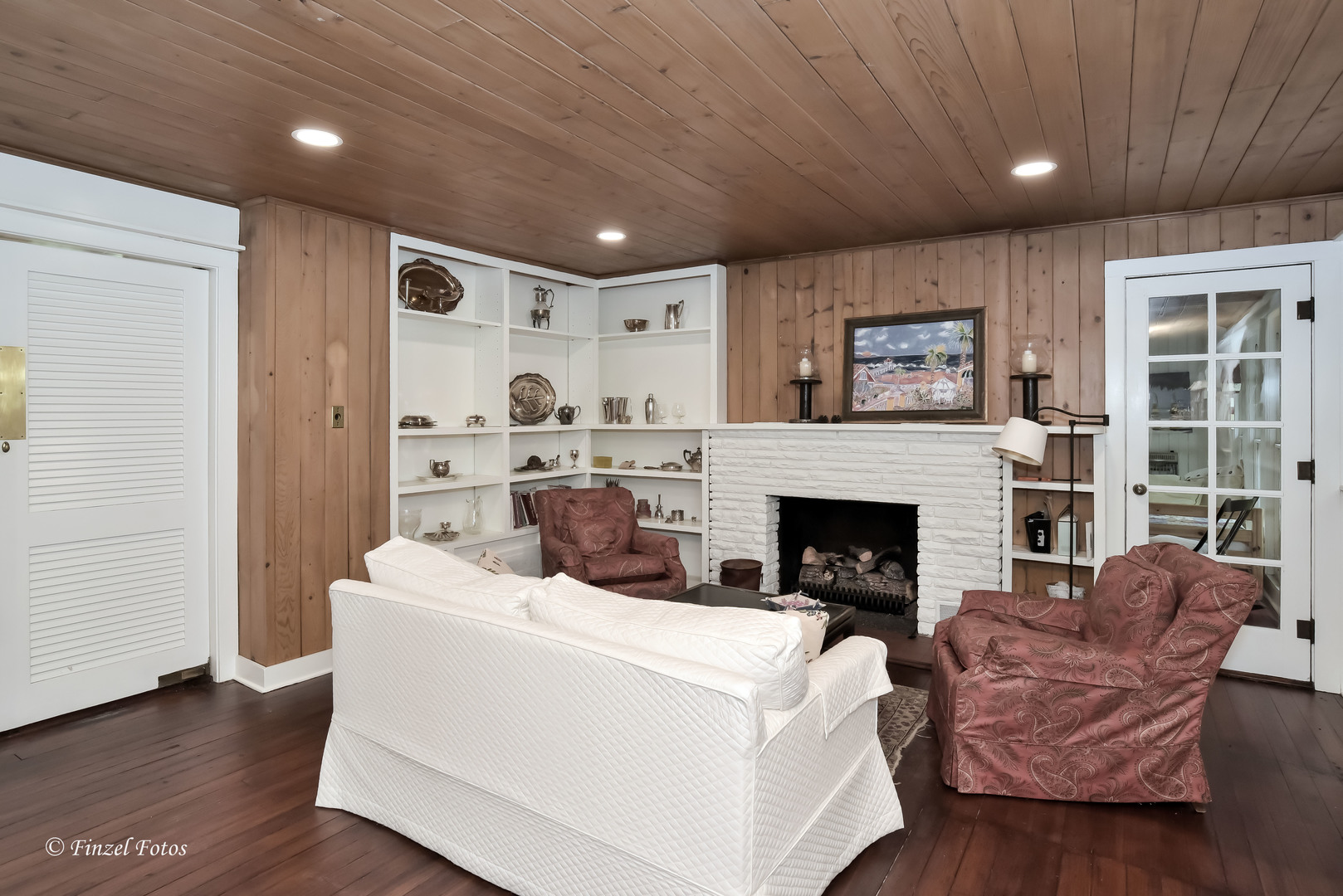 9313 Bull Valley Road Bull Valley, IL 60098 - Photo 8 of 31 a living room with furniture and a fireplace