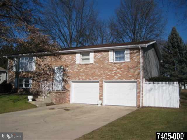 2213 Chestnut Road York, PA 17408 - Photo 1 of 25 a front view of house with yard