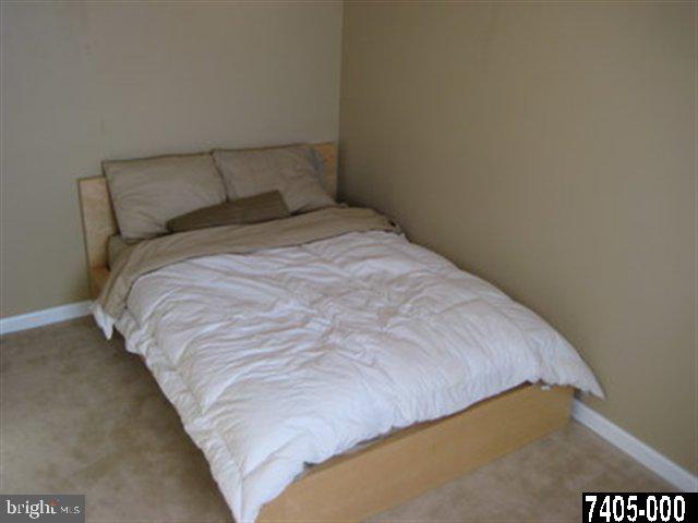 2213 Chestnut Road York, PA 17408 - Photo 15 of 25 a bedroom with a bed and a night stand
