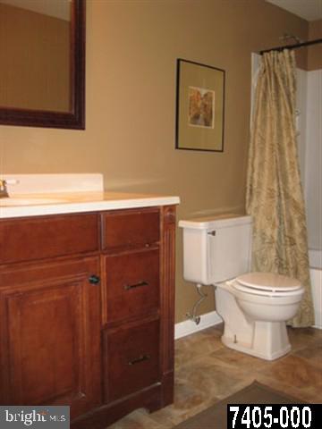 2213 Chestnut Road York, PA 17408 - Photo 16 of 25 a bathroom with a toilet and a shower