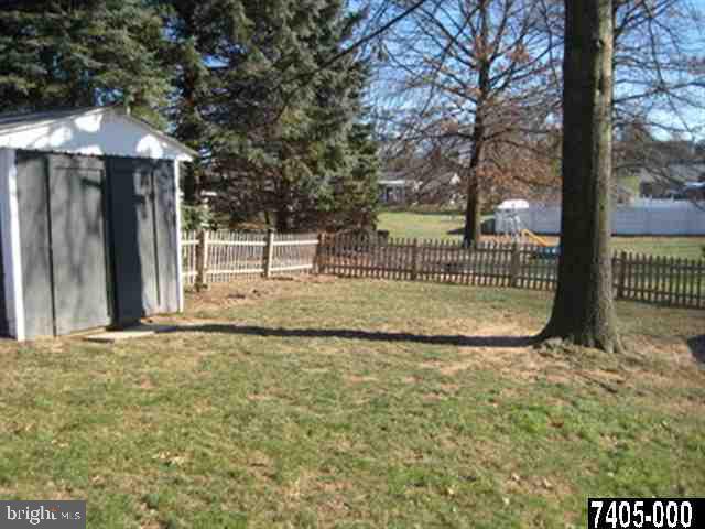 2213 Chestnut Road York, PA 17408 - Photo 21 of 25 a view of a backyard with wooden fence