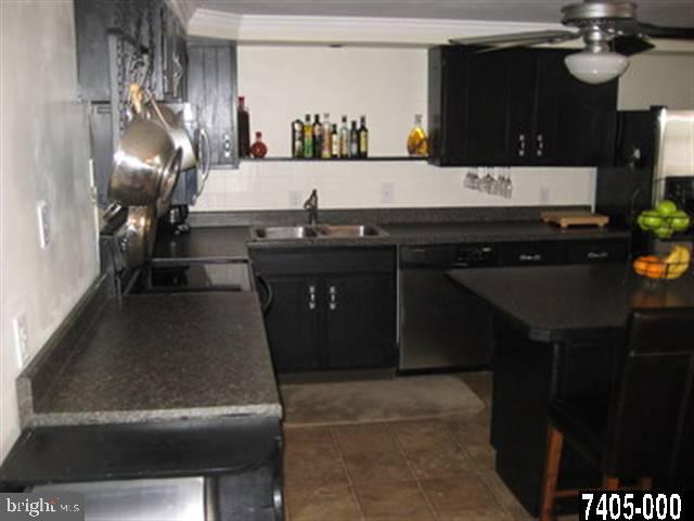 2213 Chestnut Road York, PA 17408 - Photo 4 of 25 a kitchen with a sink and cabinets