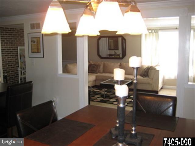 2213 Chestnut Road York, PA 17408 - Photo 6 of 25 a view of entryway and hall with wooden floor