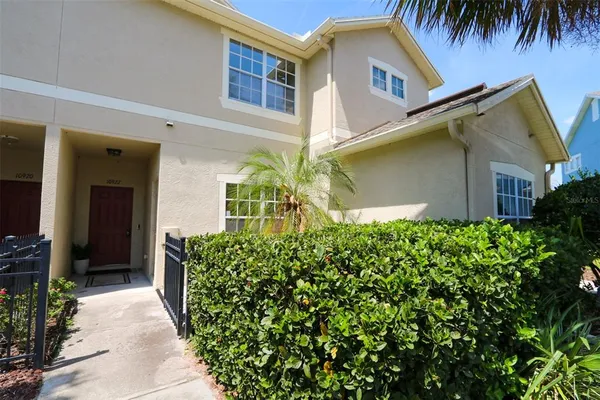 front view of a house with a small yard