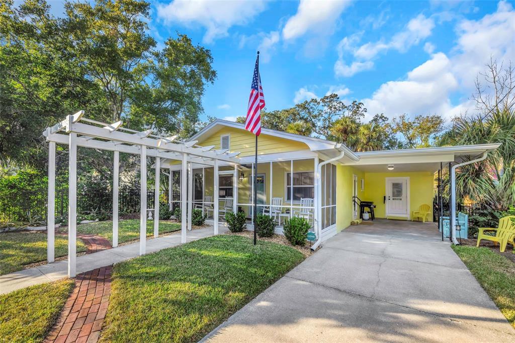 116 Read Street Tarpon Springs, FL 34689 - Photo 11 of 49 a view of a house with backyard porch and sitting area