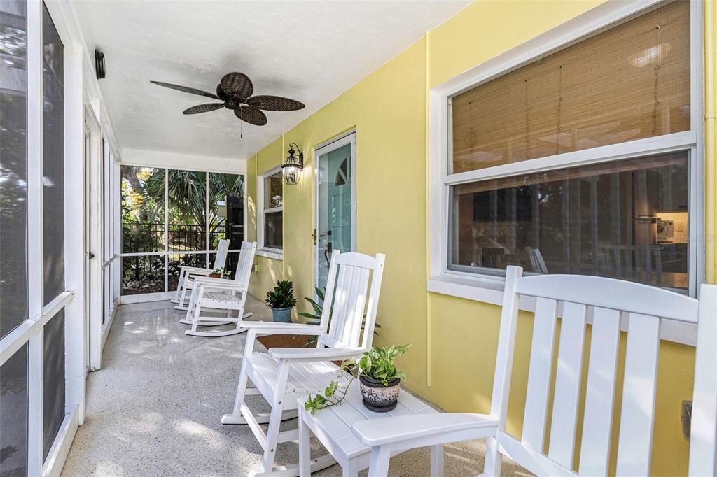 116 Read Street Tarpon Springs, FL 34689 - Photo 15 of 49 a view of a patio with table and chairs and potted plants