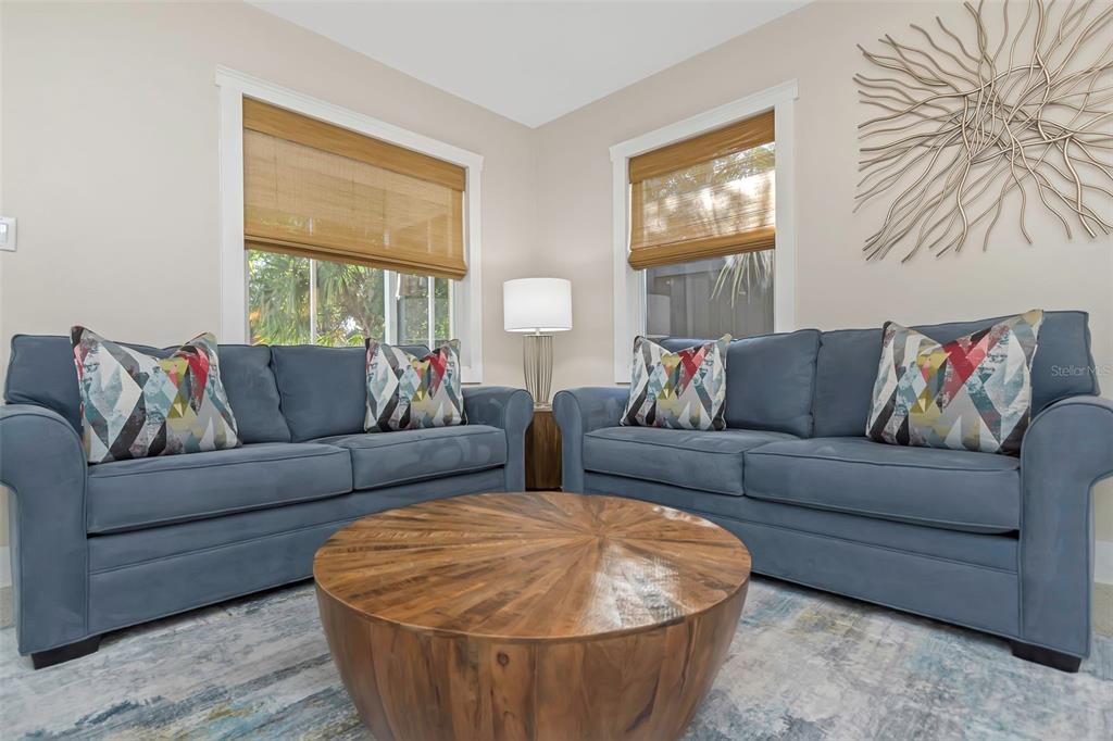 116 Read Street Tarpon Springs, FL 34689 - Photo 33 of 49 a living room with furniture and a large window