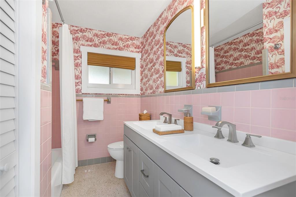 116 Read Street Tarpon Springs, FL 34689 - Photo 46 of 49 a bathroom with a sink mirror and toilet