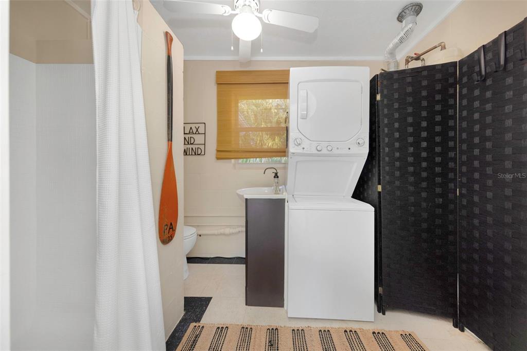 116 Read Street Tarpon Springs, FL 34689 - Photo 48 of 49 a bathroom with a sink toilet and shower