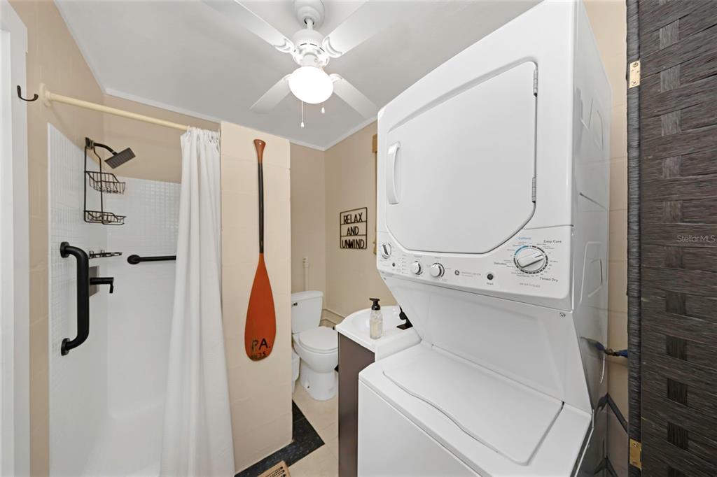 116 Read Street Tarpon Springs, FL 34689 - Photo 49 of 49 a bathroom with a mirror and a shower