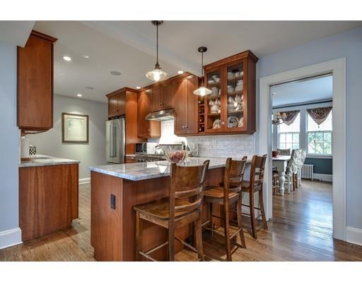 44 Bay State Road Wellesley, MA 02481 - Photo 11 of 15 a view of kitchen with dining room and wooden floor