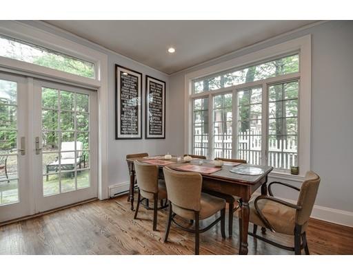 44 Bay State Road Wellesley, MA 02481 - Photo 12 of 15 a dining room with furniture and wooden floor
