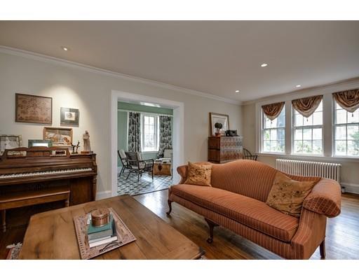 44 Bay State Road Wellesley, MA 02481 - Photo 6 of 15 a living room with furniture and a piano next to a window