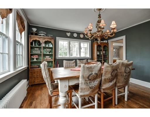 44 Bay State Road Wellesley, MA 02481 - Photo 7 of 15 a view of a dining room with furniture wooden floor and chandelier