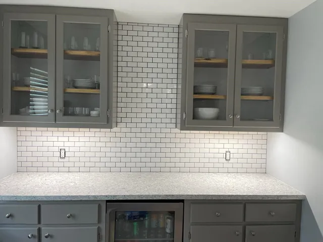 a bathroom with a sink and a shower