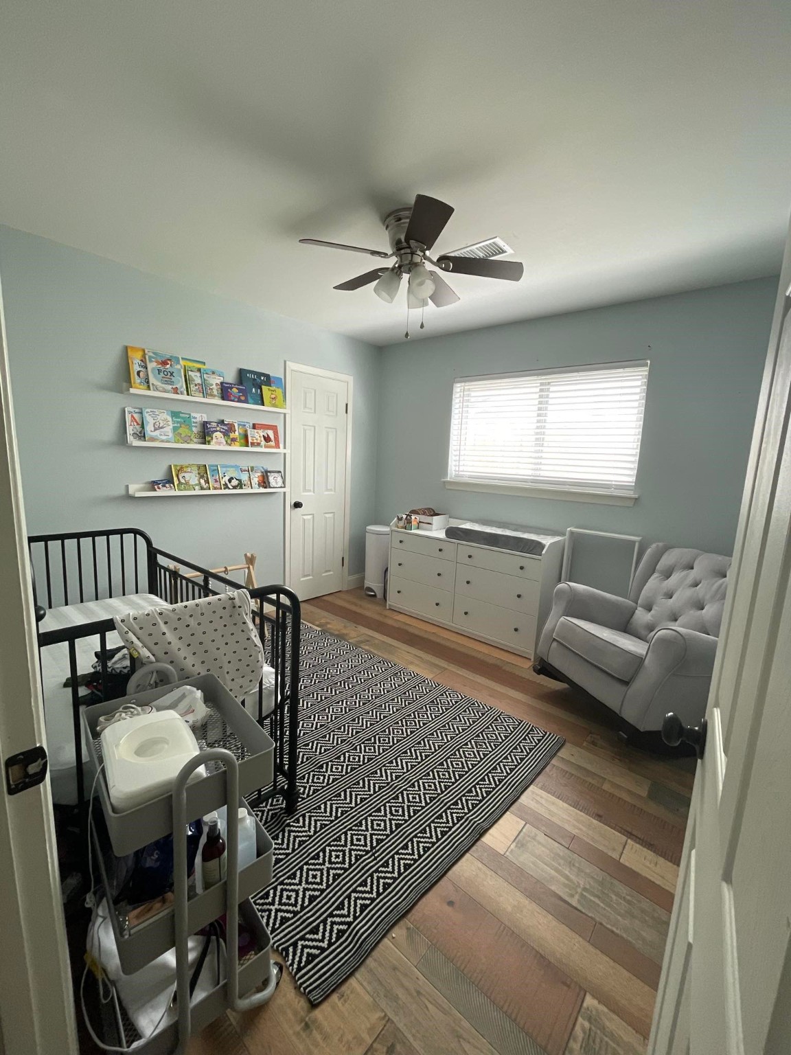 11210 Sageoak Drive Houston, TX 77089 - Photo 17 of 18 a living room with furniture and a chandelier