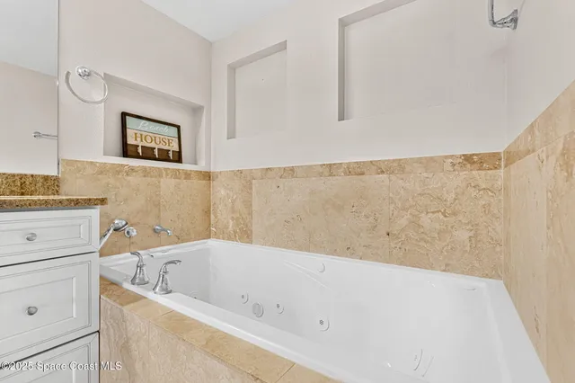 a view of a room that has a window