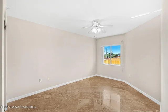 a utility room with faucet washer and dryer