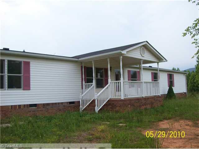 1398 Harris Road Walnut Cove, NC 27052 - Photo 1 of 7 Exterior Front.