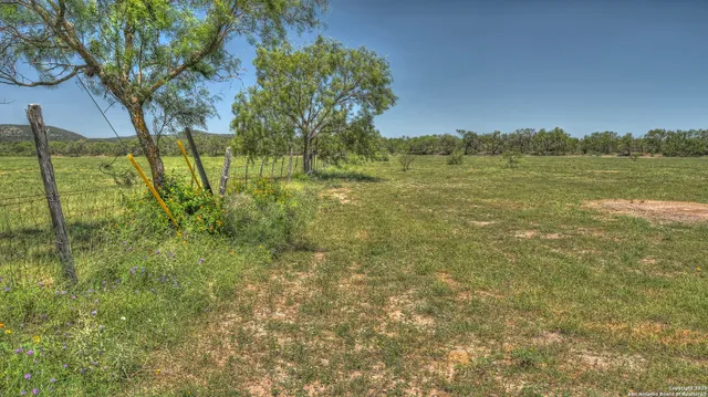 a view of an ocean and a mountain