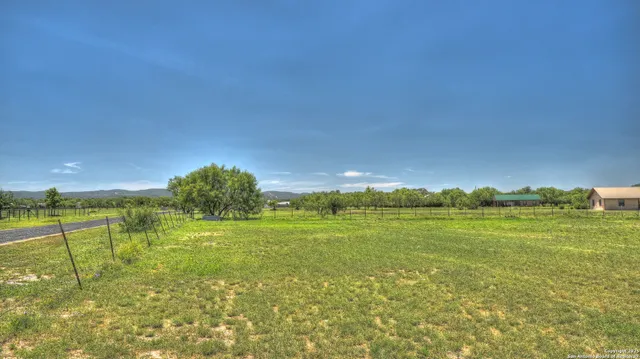 a view of an ocean and a yard