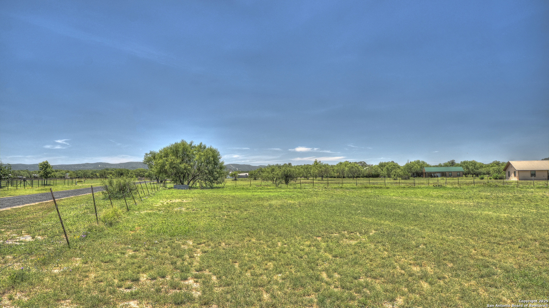 319 RiverTree N Road Rio Frio, TX 78879 - Photo 5 of 21 a view of an ocean and a yard