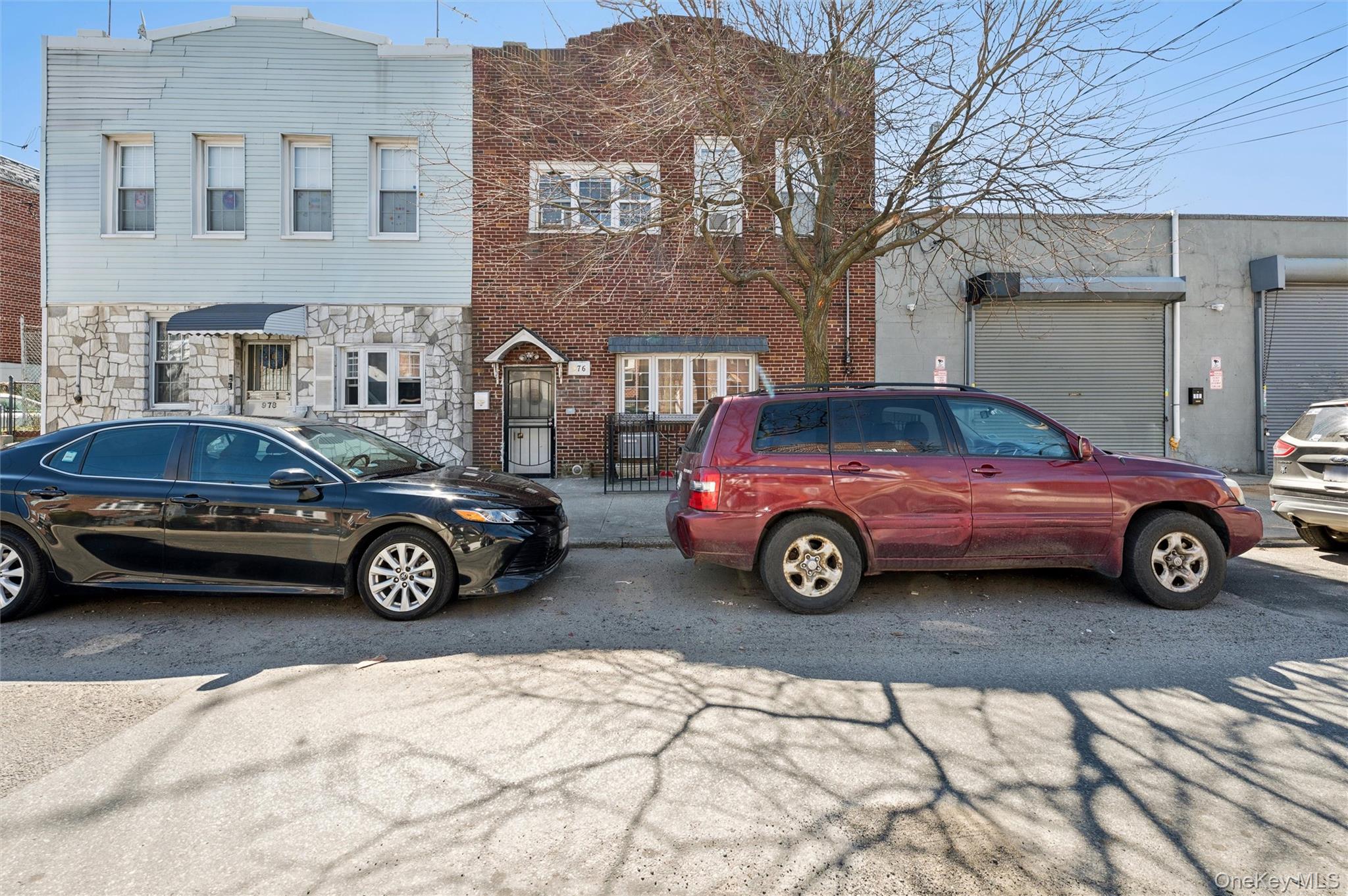 976 Sacket Avenue Bronx, NY 10462 - Photo 1 of 20 a car parked in front of a building