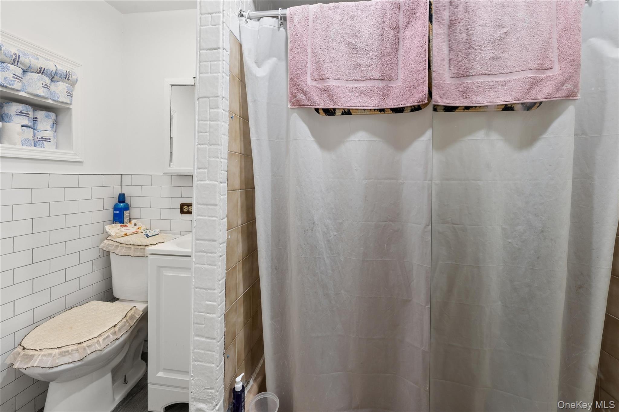 976 Sacket Avenue Bronx, NY 10462 - Photo 12 of 20 a bathroom with a sink and toilet