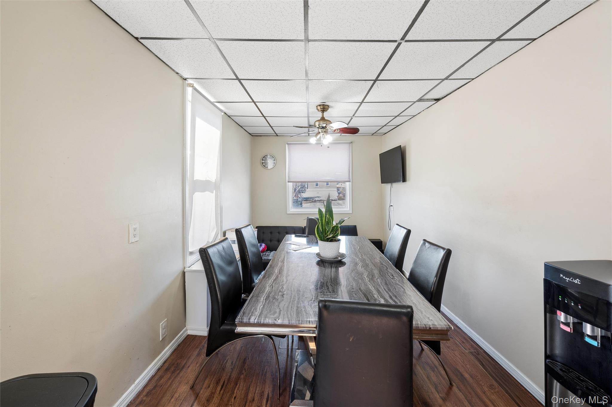 976 Sacket Avenue Bronx, NY 10462 - Photo 13 of 20 a view of a livingroom with furniture window and wooden floor