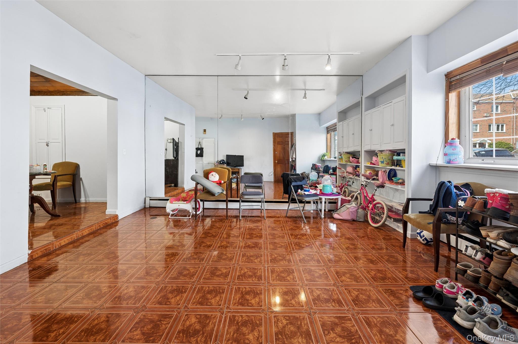 976 Sacket Avenue Bronx, NY 10462 - Photo 4 of 20 a view of a play room with gym equipment