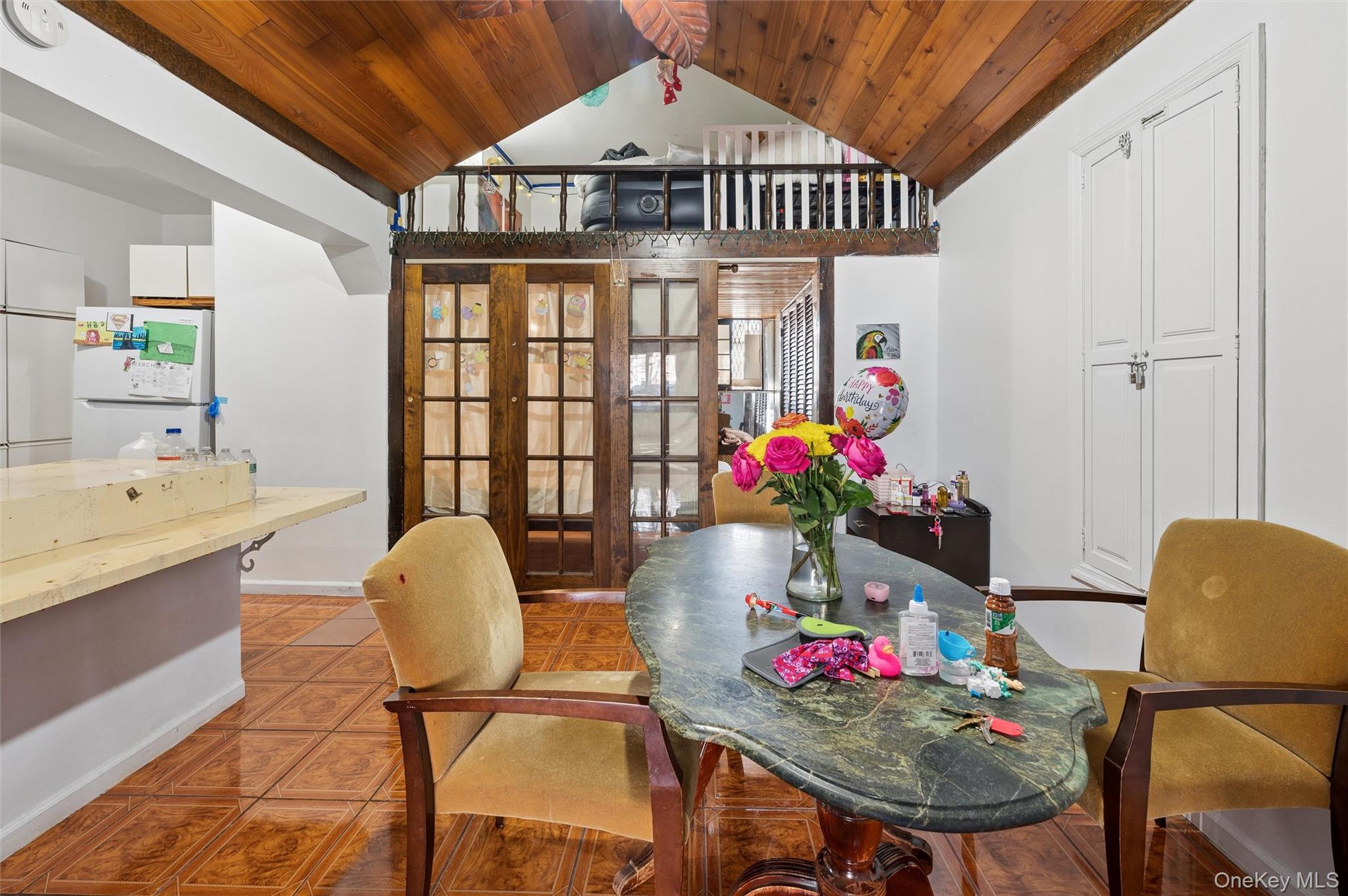 976 Sacket Avenue Bronx, NY 10462 - Photo 6 of 20 a living room with furniture and a potted plant