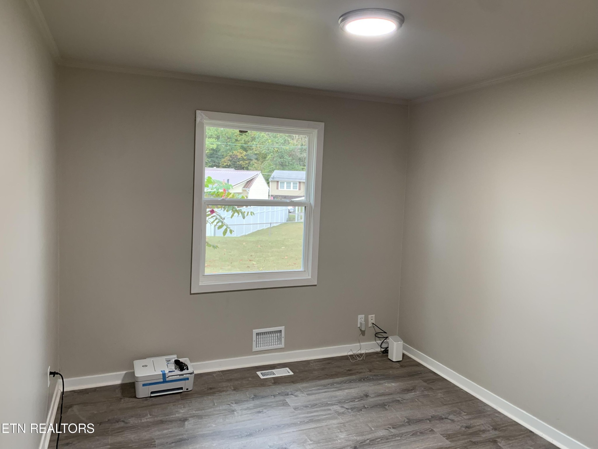 102 Audubon Road Oak Ridge, TN 37830 - Photo 12 of 19 an empty room with a window