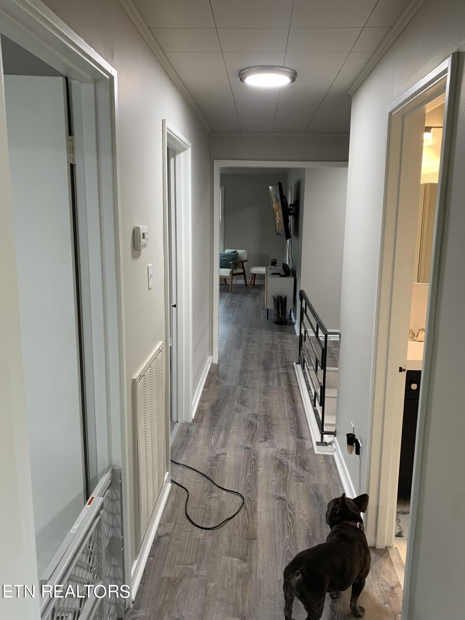 102 Audubon Road Oak Ridge, TN 37830 - Photo 13 of 19 a hallway with a view of living room