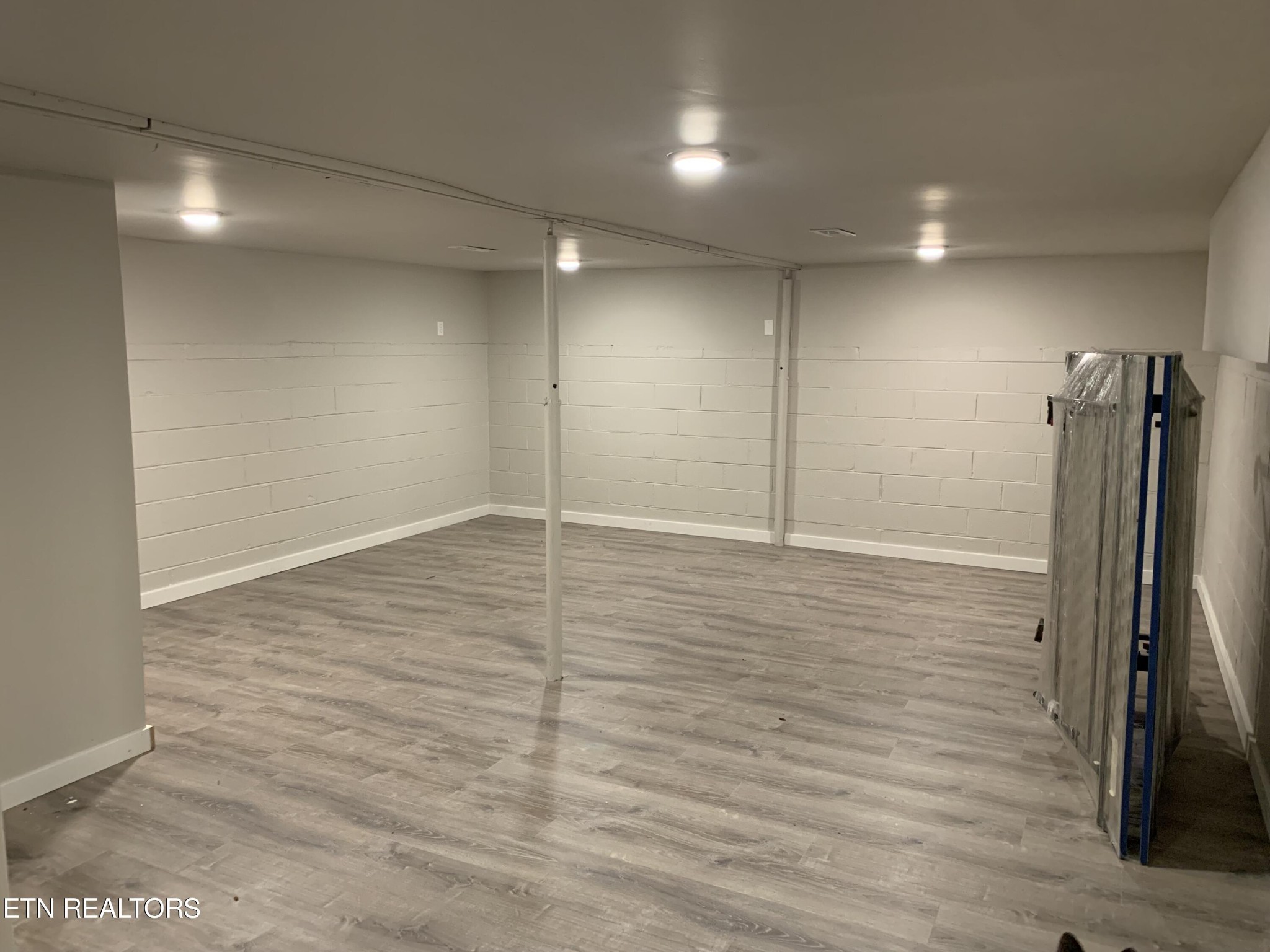 102 Audubon Road Oak Ridge, TN 37830 - Photo 15 of 19 a view of hallway with a wooden floor
