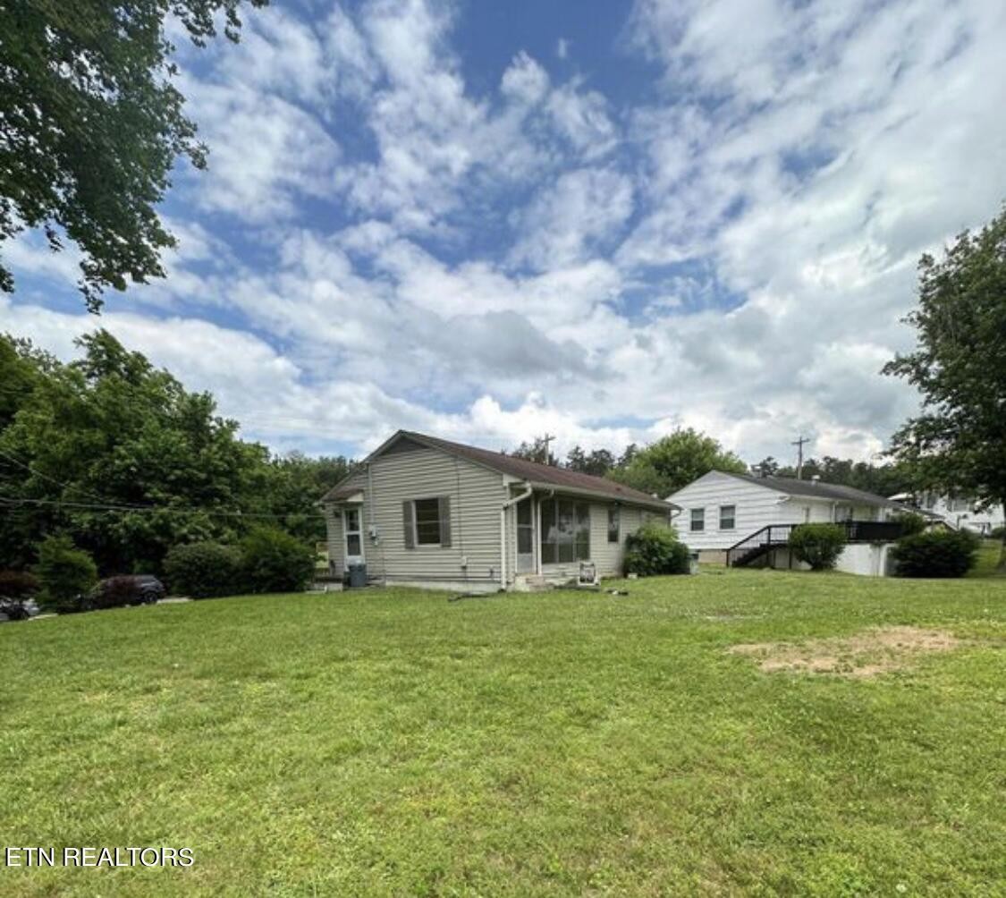 102 Audubon Road Oak Ridge, TN 37830 - Photo 17 of 19 a view of house with garden