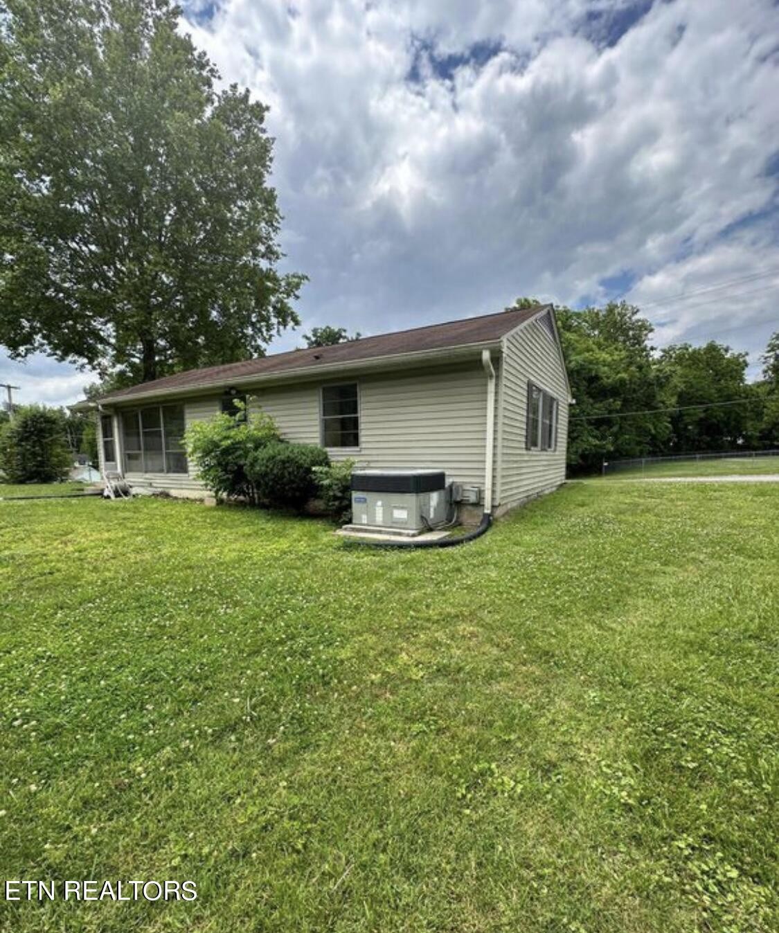 102 Audubon Road Oak Ridge, TN 37830 - Photo 18 of 19 a front view of house with yard and green space