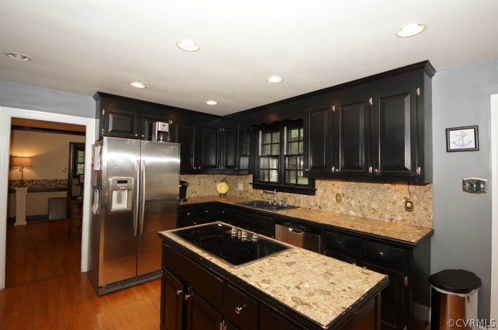 2400 Castlebridge Road Midlothian, VA 23113 - Photo 4 of 12 a kitchen with granite countertop a stove and a refrigerator