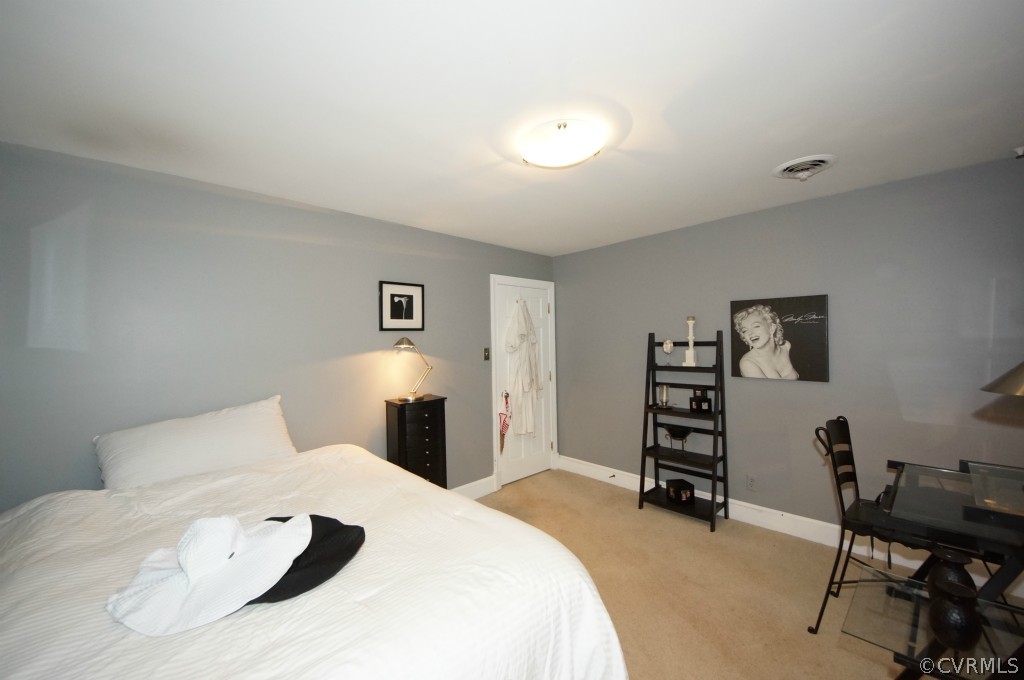 2400 Castlebridge Road Midlothian, VA 23113 - Photo 8 of 12 a bedroom with a bed and a workspace