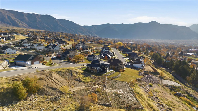 1211 West Fallow Way Ogden, UT 84414 - Photo 10 of 20 Aerial overview of property's location featuring nearby suburban area and a mountain backdrop
