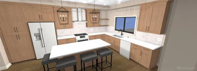 a kitchen with stainless steel appliances a refrigerator and a stove