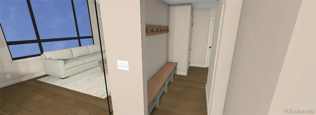 a view of a hallway with furniture